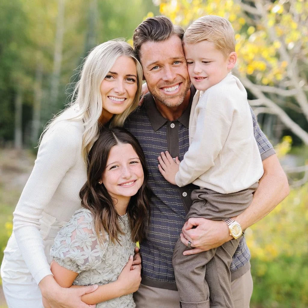 Brooke and Nick Rowe with their two children outdoors in Millcreek, Utah